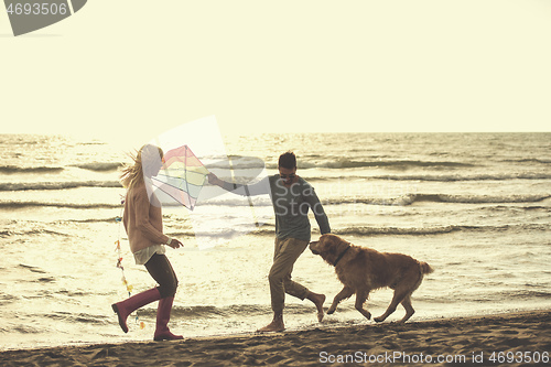 Image of happy couple enjoying time together at beach