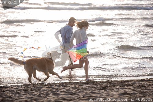 Image of happy couple enjoying time together at beach