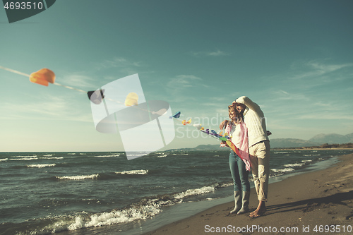 Image of Couple enjoying time together at beach