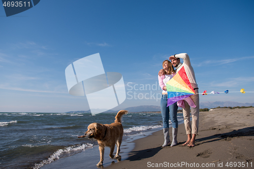 Image of happy couple enjoying time together at beach