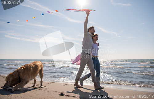 Image of happy couple enjoying time together at beach