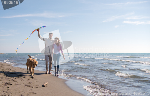 Image of happy couple enjoying time together at beach