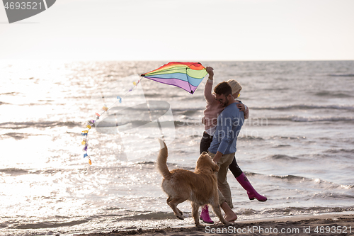 Image of happy couple enjoying time together at beach