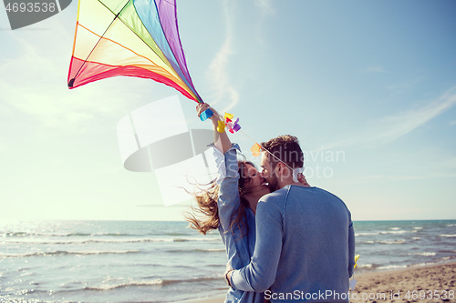 Image of Couple enjoying time together at beach