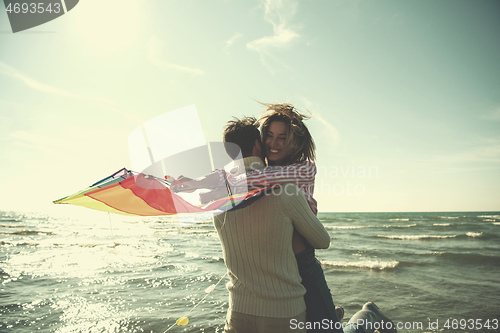 Image of Couple enjoying time together at beach