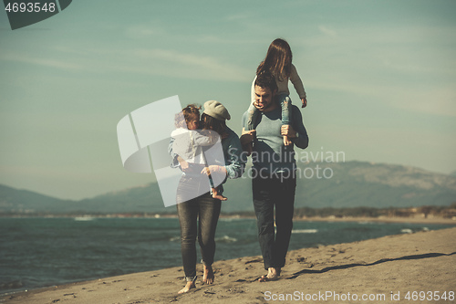 Image of Young family enjoying vecation during autumn