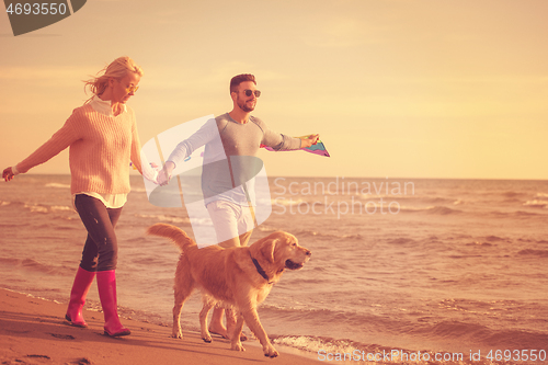 Image of happy couple enjoying time together at beach