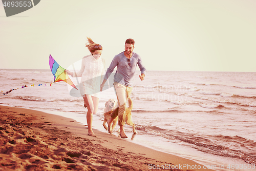 Image of happy couple enjoying time together at beach