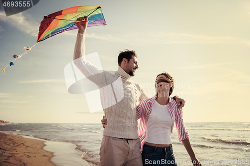 Image of Couple enjoying time together at beach