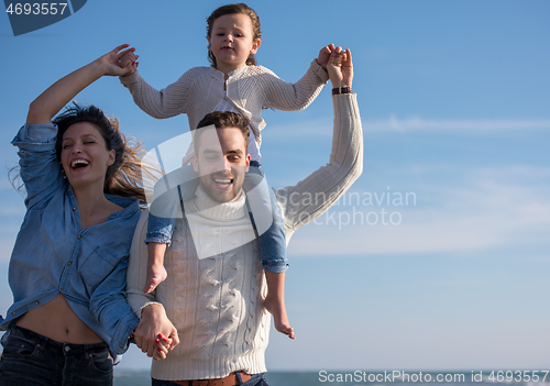 Image of Young family enjoying vecation during autumn