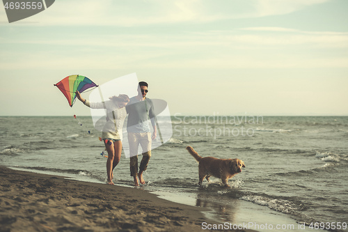 Image of happy couple enjoying time together at beach