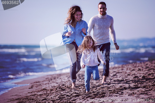 Image of Young family enjoying vecation during autumn