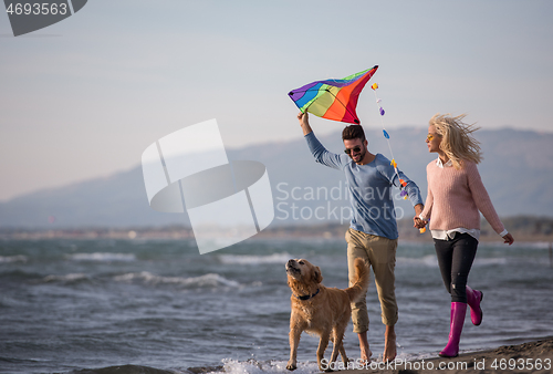 Image of happy couple enjoying time together at beach