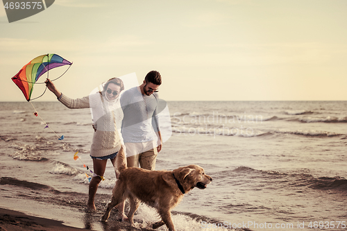 Image of happy couple enjoying time together at beach