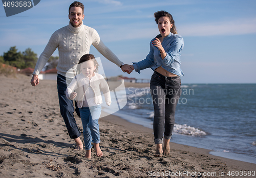 Image of Young family enjoying vecation during autumn