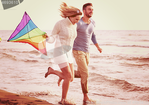 Image of Couple enjoying time together at beach