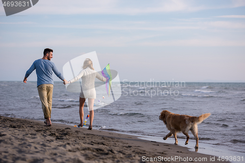 Image of happy couple enjoying time together at beach