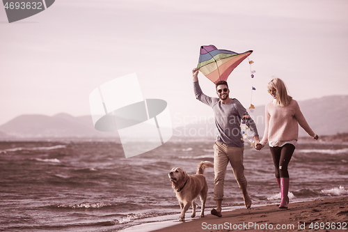 Image of happy couple enjoying time together at beach