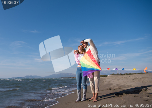 Image of Couple enjoying time together at beach