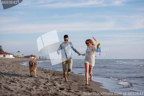 Image of happy couple enjoying time together at beach