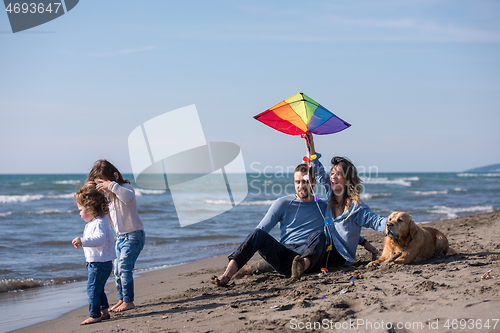 Image of happy young family enjoying vecation during autumn day