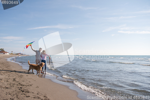 Image of happy couple enjoying time together at beach