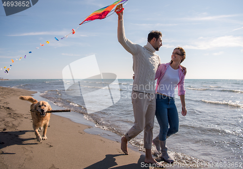 Image of happy couple enjoying time together at beach