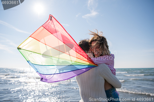 Image of Couple enjoying time together at beach