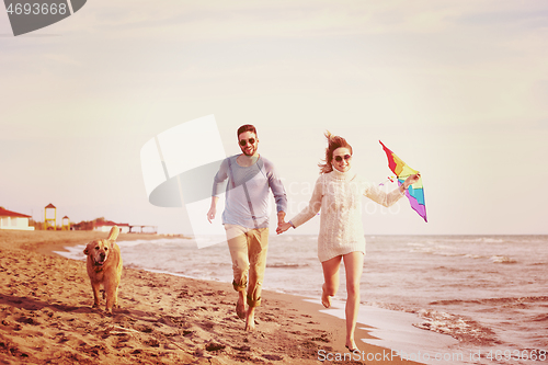 Image of happy couple enjoying time together at beach