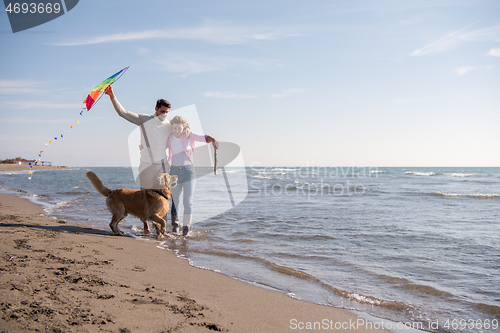 Image of happy couple enjoying time together at beach