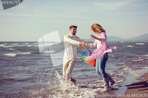 Image of Couple enjoying time together at beach