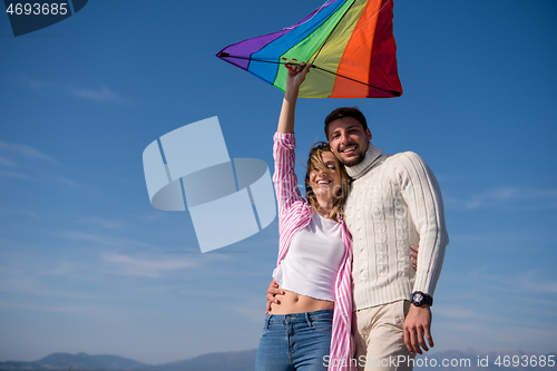 Image of Couple enjoying time together at beach