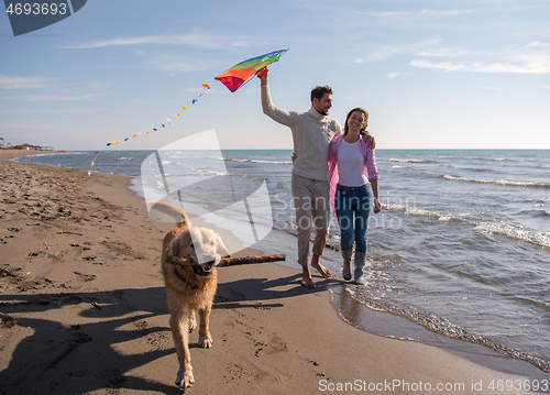 Image of happy couple enjoying time together at beach