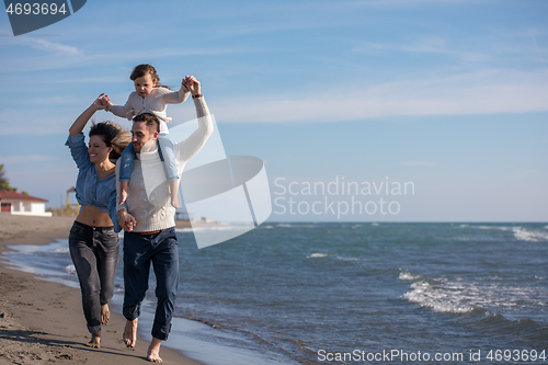 Image of Young family enjoying vecation during autumn