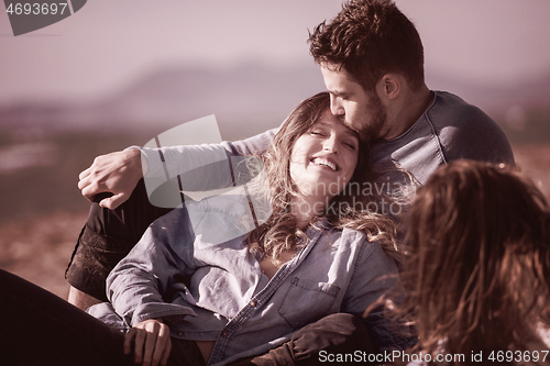 Image of Young family enjoying vecation during autumn