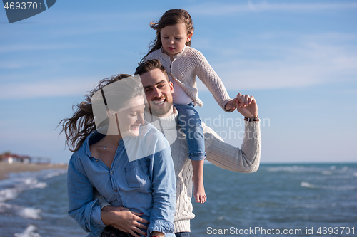 Image of Young family enjoying vecation during autumn