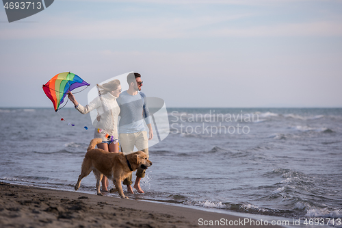 Image of happy couple enjoying time together at beach