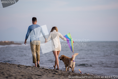 Image of happy couple enjoying time together at beach