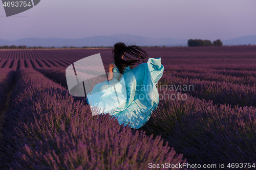 Image of woman in lavender flower field