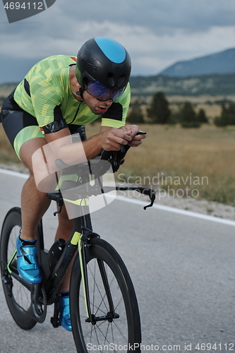 Image of triathlon athlete riding bike