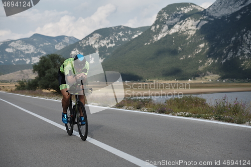 Image of triathlon athlete riding bike