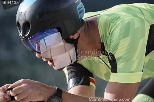 Image of triathlon athlete riding bike