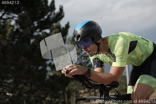 Image of triathlon athlete riding bike