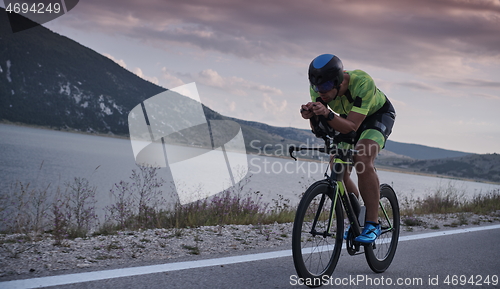 Image of triathlon athlete riding bike