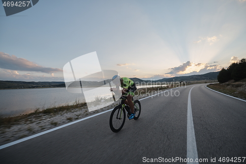 Image of triathlon athlete riding bike