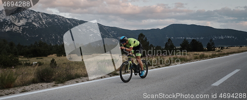 Image of triathlon athlete riding bike