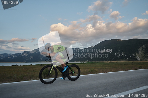 Image of triathlon athlete riding bike