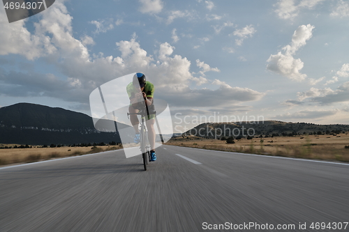 Image of triathlon athlete riding bike