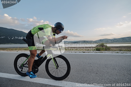 Image of triathlon athlete riding bike