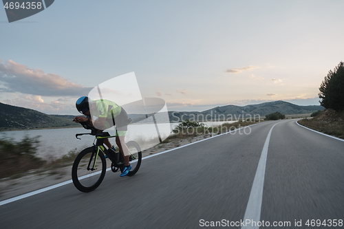 Image of triathlon athlete riding bike